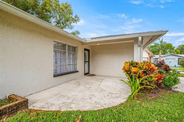 a backyard of a house with lots of green space