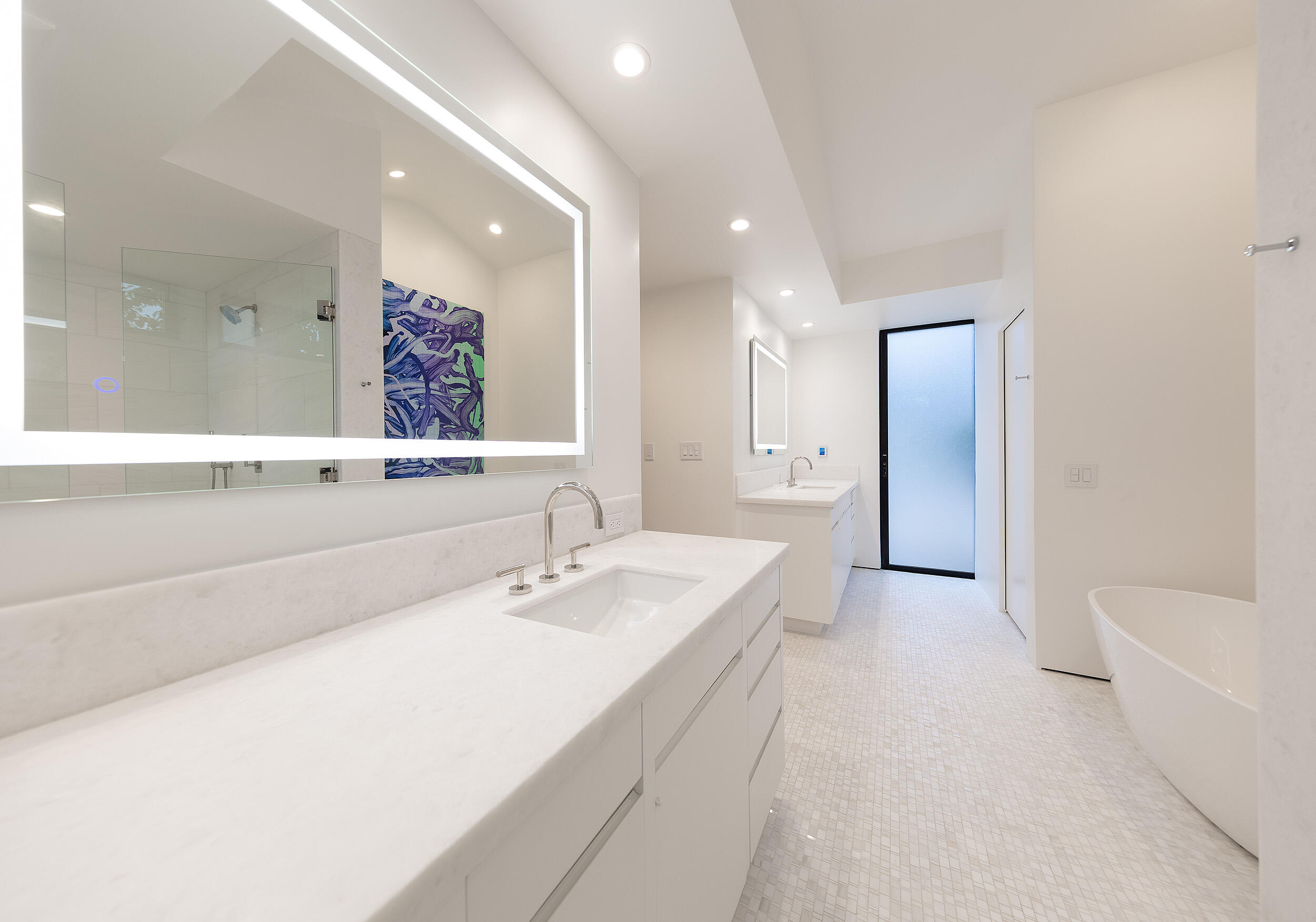 1988 Inverness Lane Montecito, CA 93108 - Photo 16 of 30 a spacious bathroom with a bathtub sink and mirror