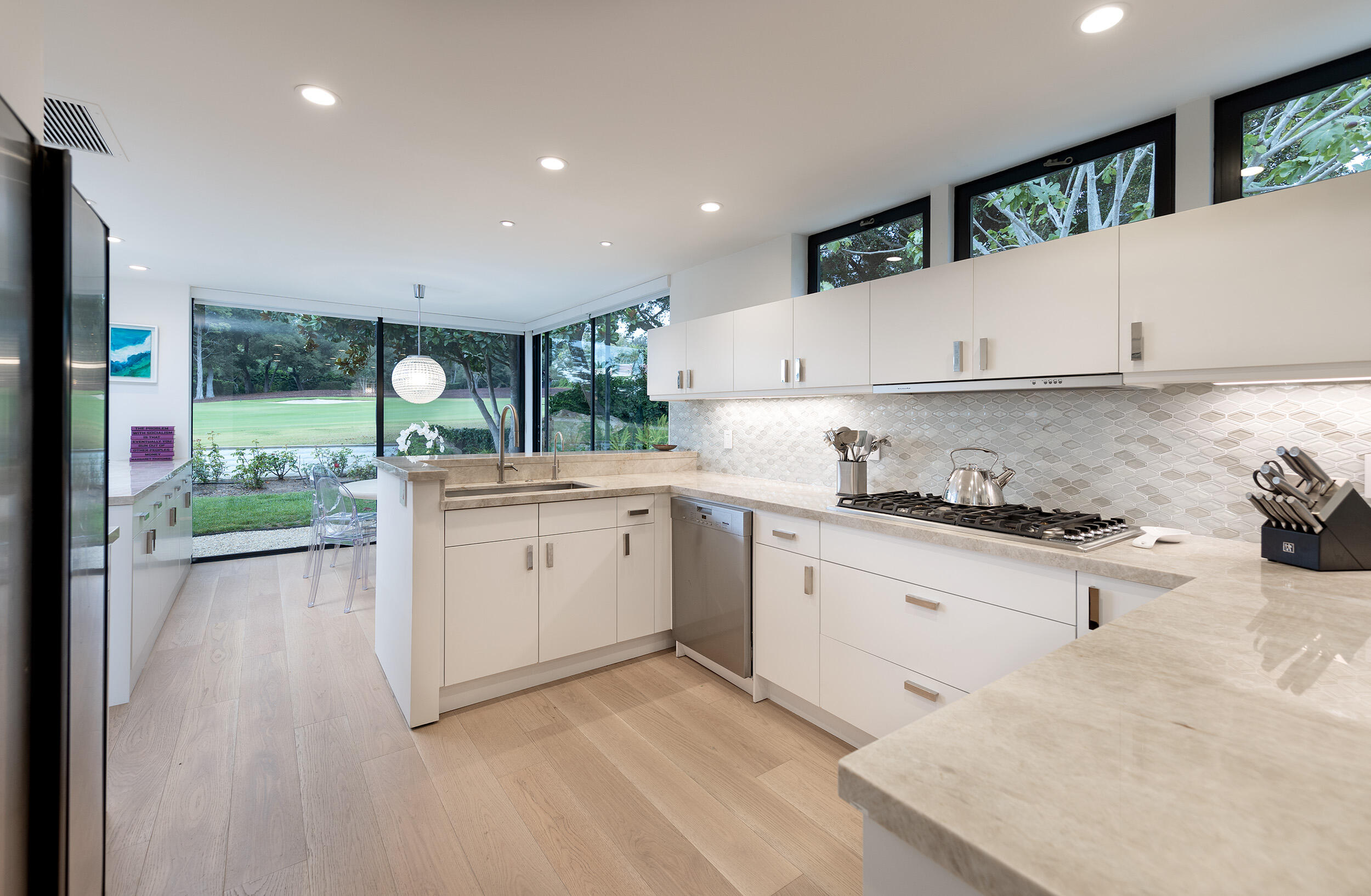 1988 Inverness Lane Montecito, CA 93108 - Photo 8 of 30 a kitchen with a sink stove and cabinets