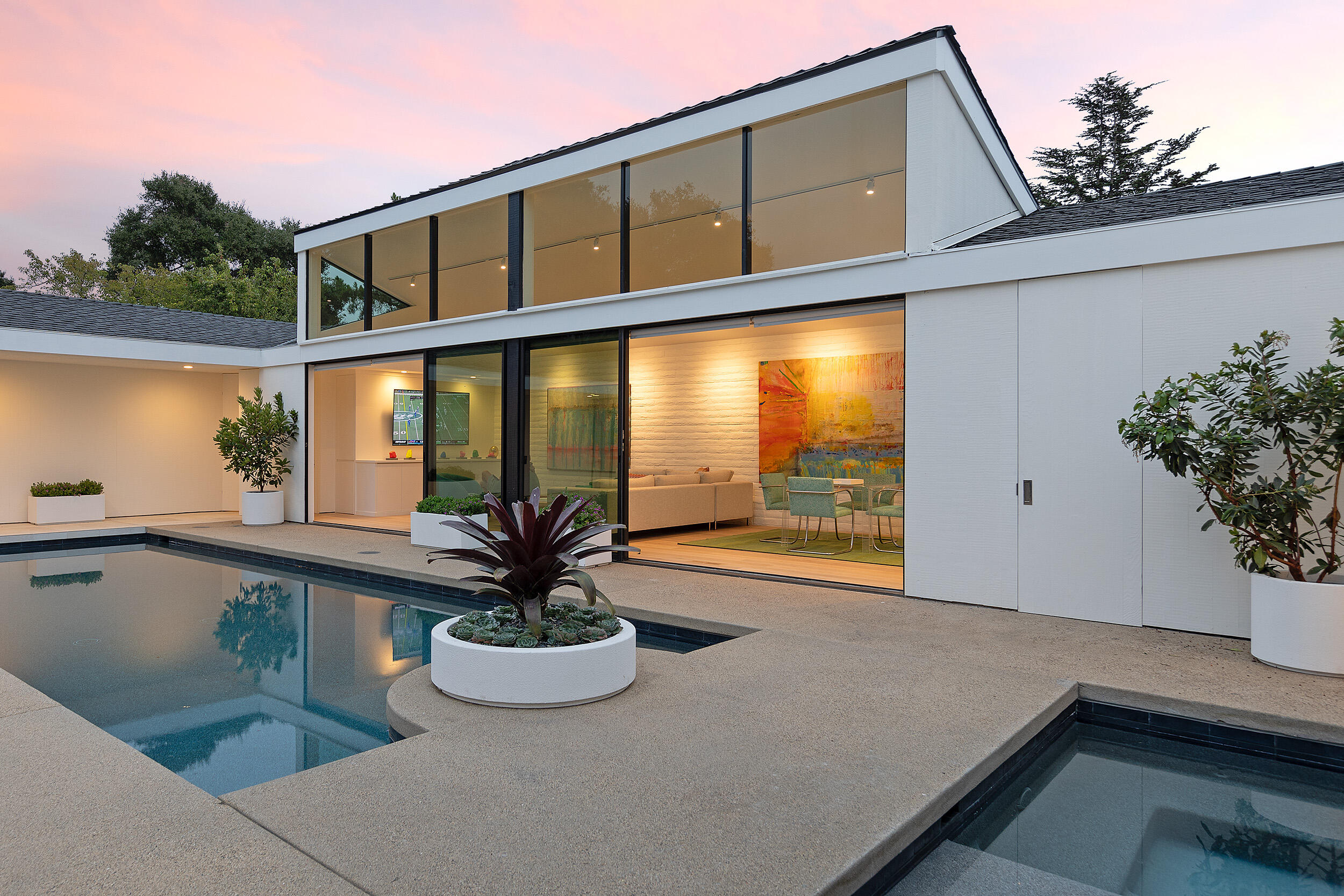 1988 Inverness Lane Montecito, CA 93108 - Photo 10 of 30 a view of a house with a potted plant and floor to ceiling windows