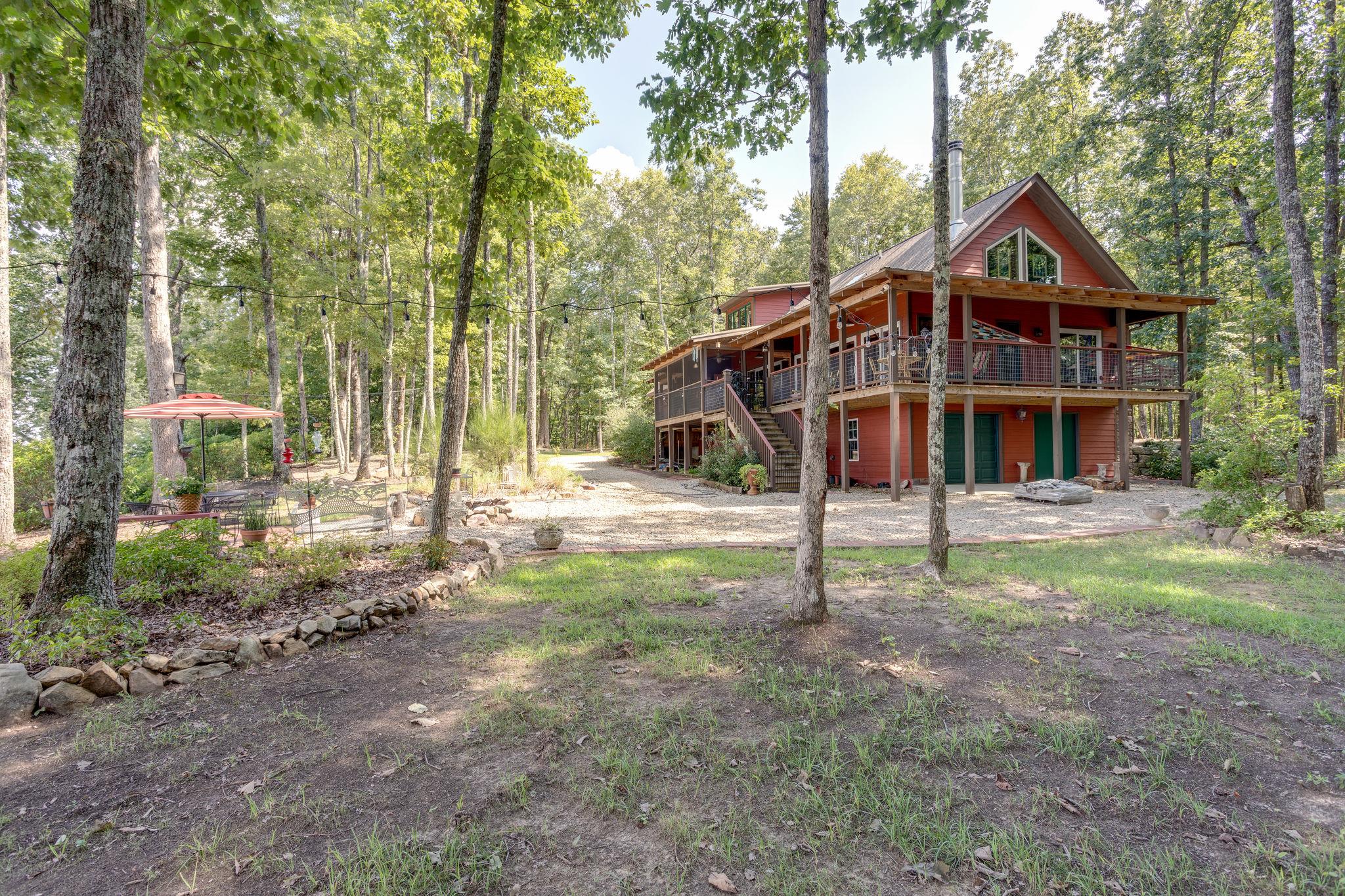 2355 Eagle Bluff Road Monteagle, TN 37356 - Photo 22 of 30 Side view showing the entrance into the walk out basement.