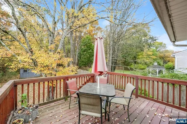 a view of a two chairs in the deck