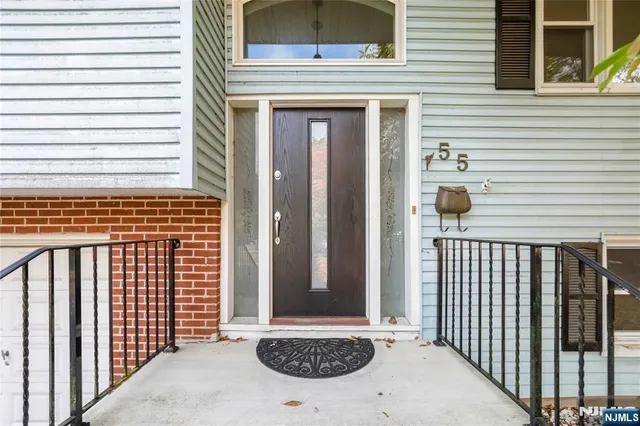 a view of a door and a window