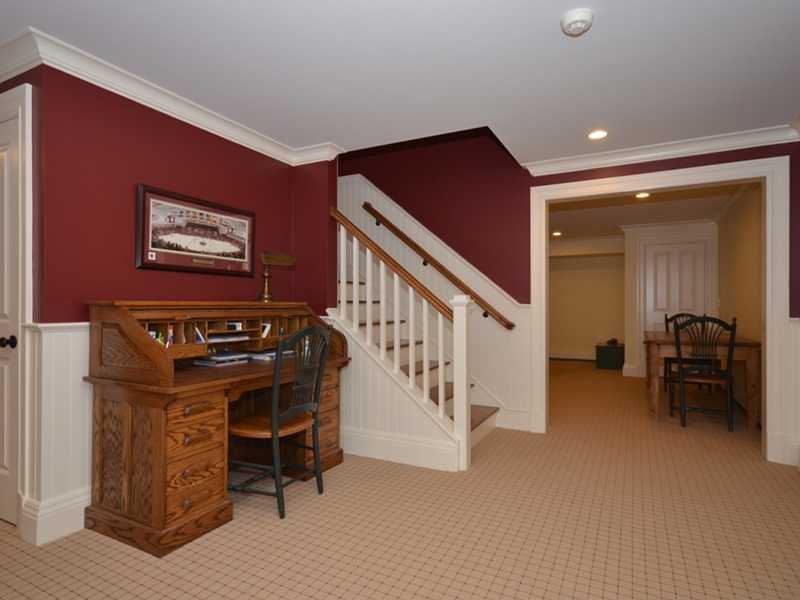 253 Middlesex Road Darien, CT 06820 - Photo 20 of 25 a view of a hallway with workspace and furniture