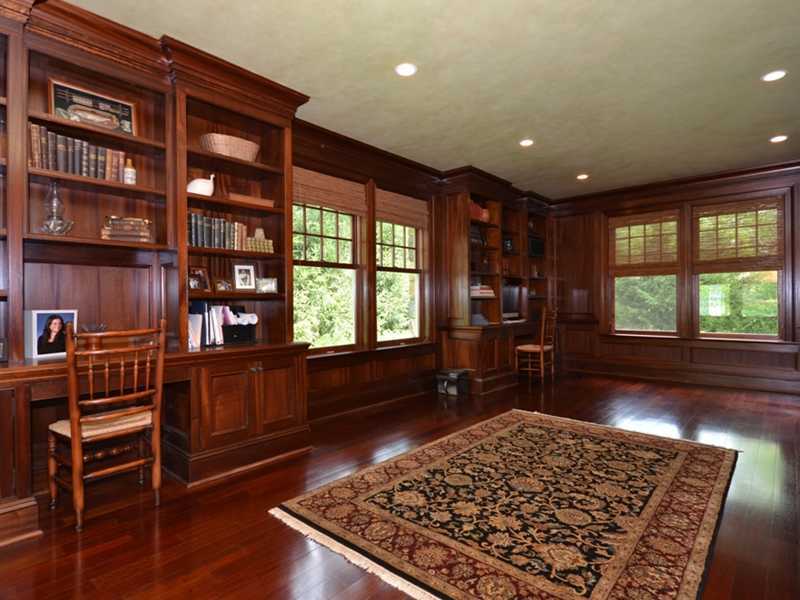 253 Middlesex Road Darien, CT 06820 - Photo 7 of 25 a living room with furniture or couch and a bookshelf