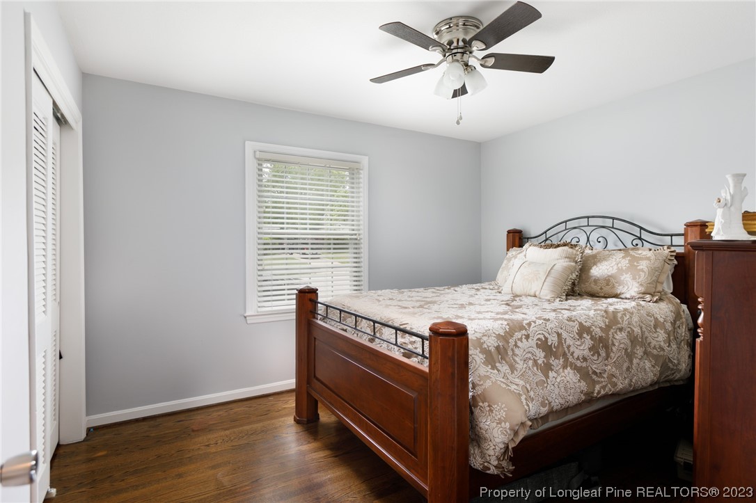 2620 Huntington Road Fayetteville, NC 28303 - Photo 11 of 23 a bed sitting in a bedroom next to a window