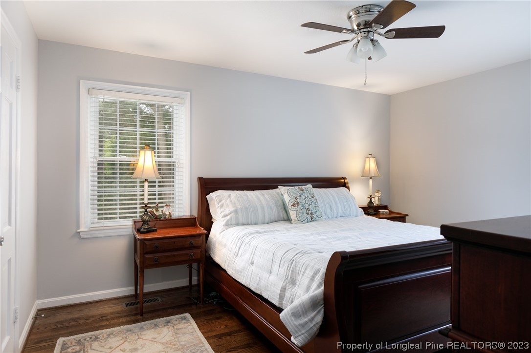 2620 Huntington Road Fayetteville, NC 28303 - Photo 13 of 23 a bedroom with a bed and a window