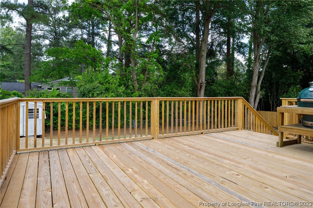 2620 Huntington Road Fayetteville, NC 28303 - Photo 20 of 23 a balcony with wooden floor