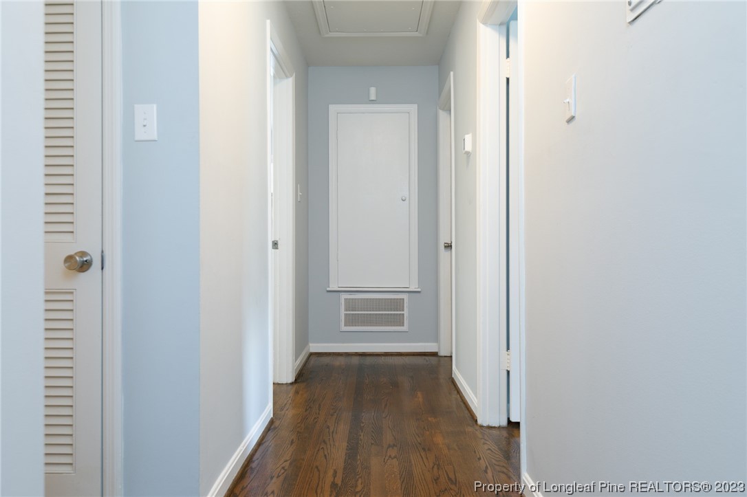 2620 Huntington Road Fayetteville, NC 28303 - Photo 10 of 23 a view of a hallway with wooden floor