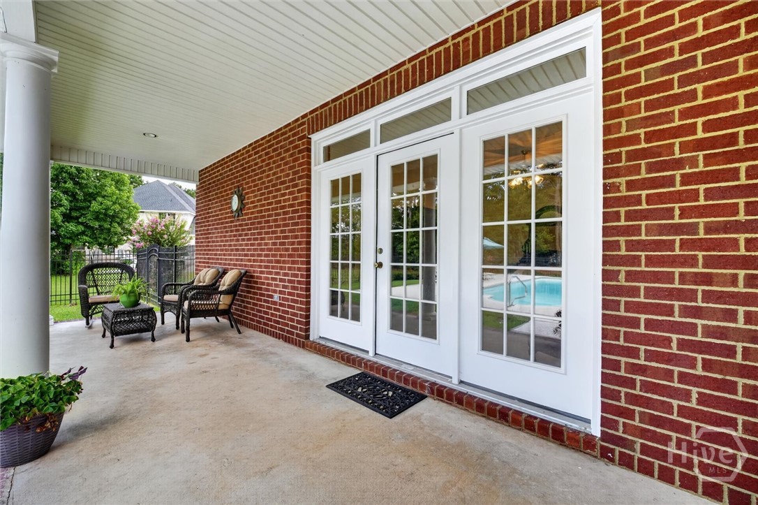 130 Cambridge Drive Rincon, GA 31326 - Photo 51 of 70 Covered Back Porch
