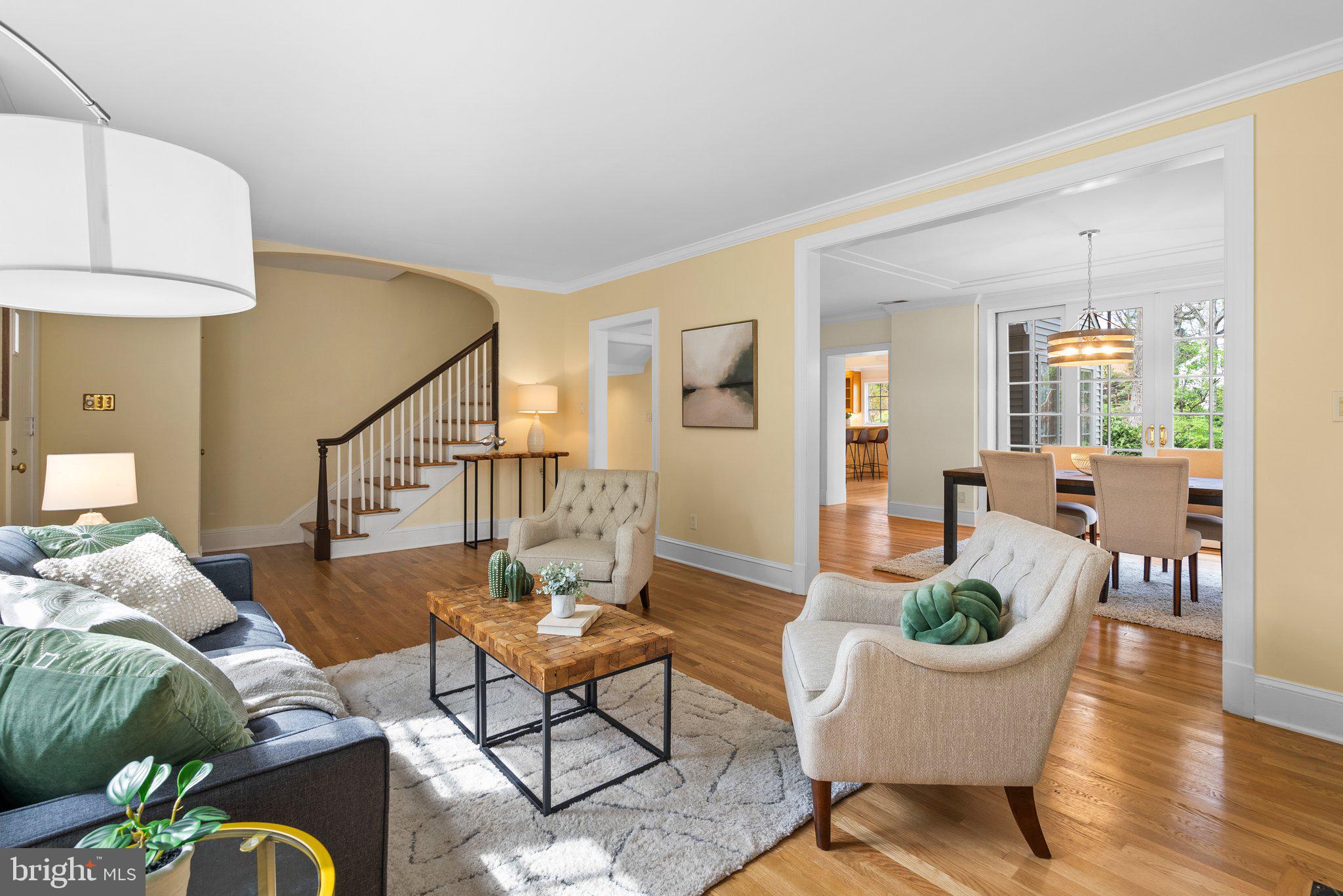1203 Highland Drive Silver Spring, MD 20910 - Photo 9 of 59 A cased opening from Living Room to Dining Room