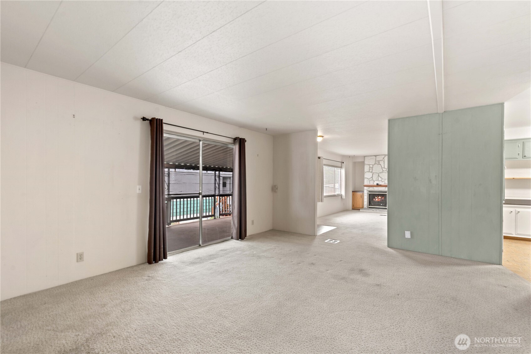 1311 Maple Street, Unit 18 Wenatchee, WA 98801 - Photo 13 of 28 an empty room with a cabinet and mirrors