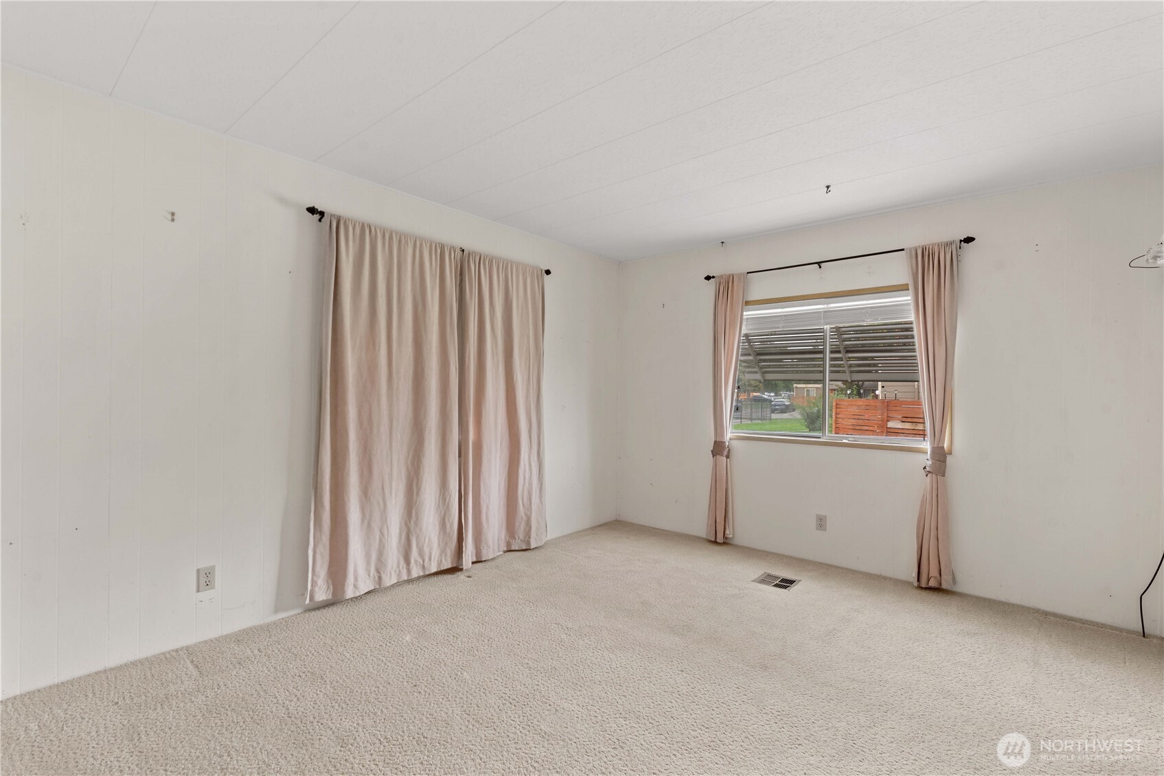 1311 Maple Street, Unit 18 Wenatchee, WA 98801 - Photo 16 of 28 an empty room with windows