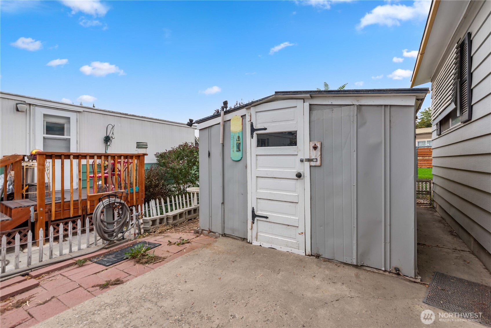 1311 Maple Street, Unit 18 Wenatchee, WA 98801 - Photo 26 of 28 a view of a porch with wooden floor