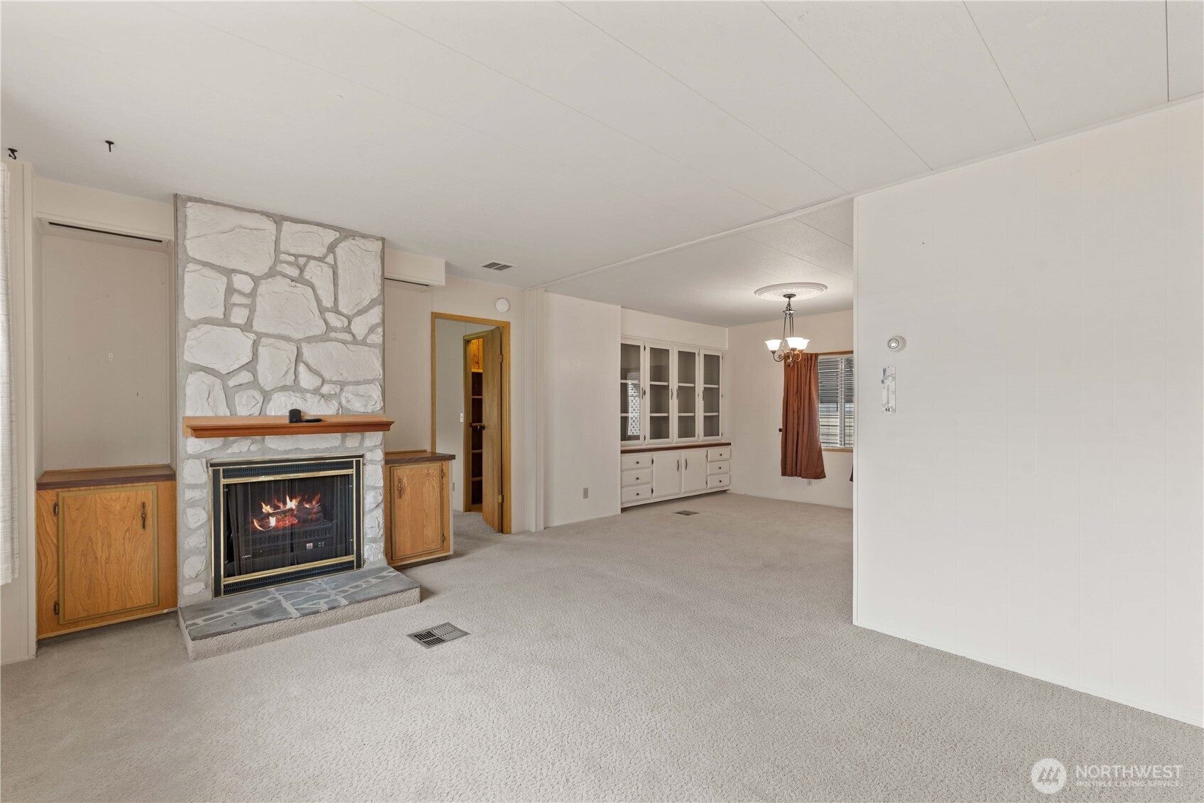 1311 Maple Street, Unit 18 Wenatchee, WA 98801 - Photo 5 of 28 a view of a livingroom with a fireplace and window