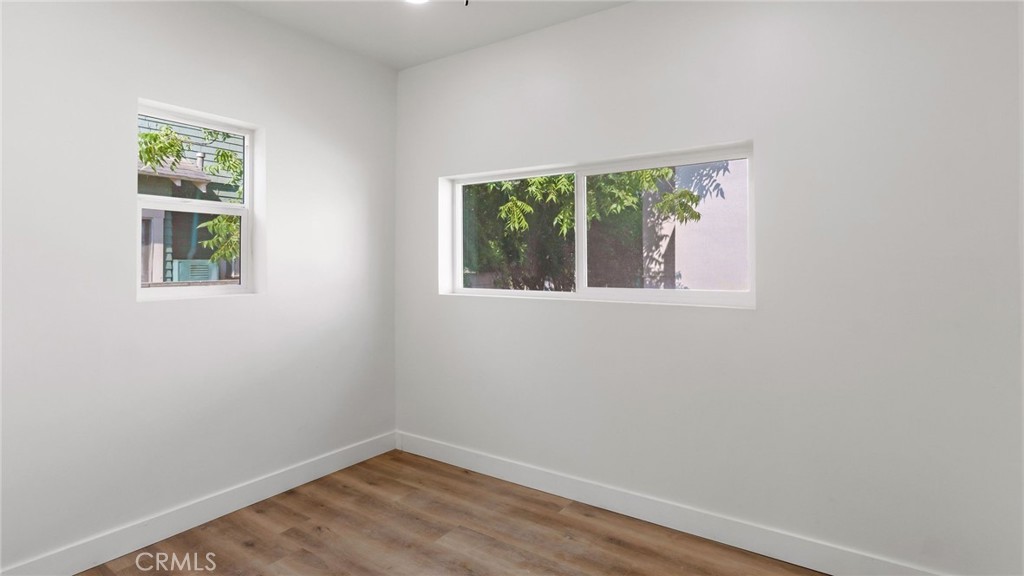 3309 Locust Street Riverside, CA 92501 - Photo 8 of 14 an empty room with a window