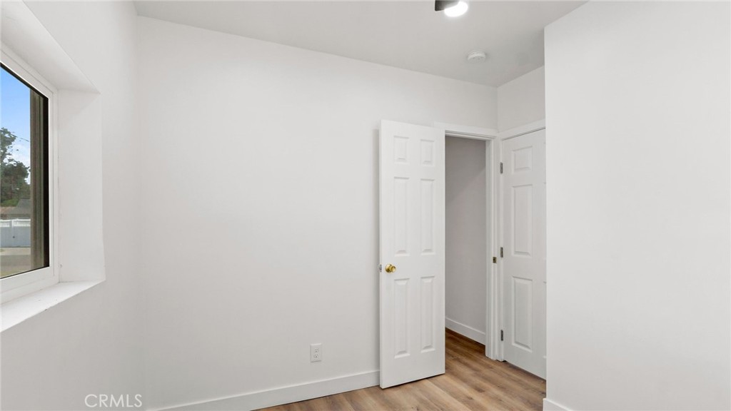 3309 Locust Street Riverside, CA 92501 - Photo 9 of 14 a view of a bathroom with wooden floor