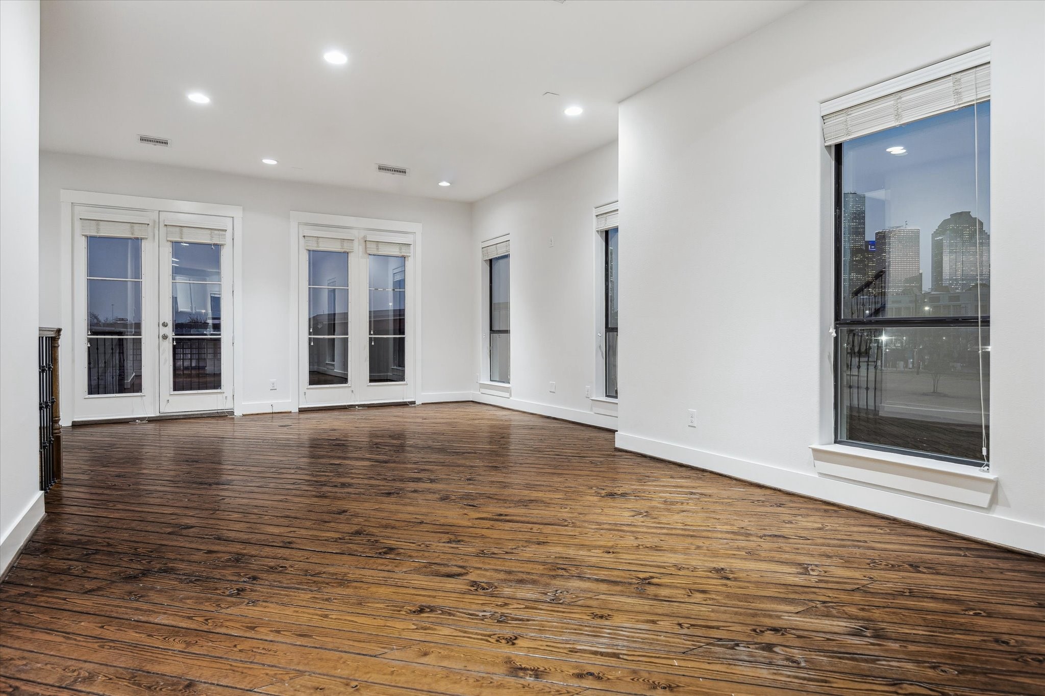 1819 Dart Street Houston, TX 77007 - Photo 16 of 30 There is wiring for surround sound in the living room ceiling and gorgeous views of Downtown!