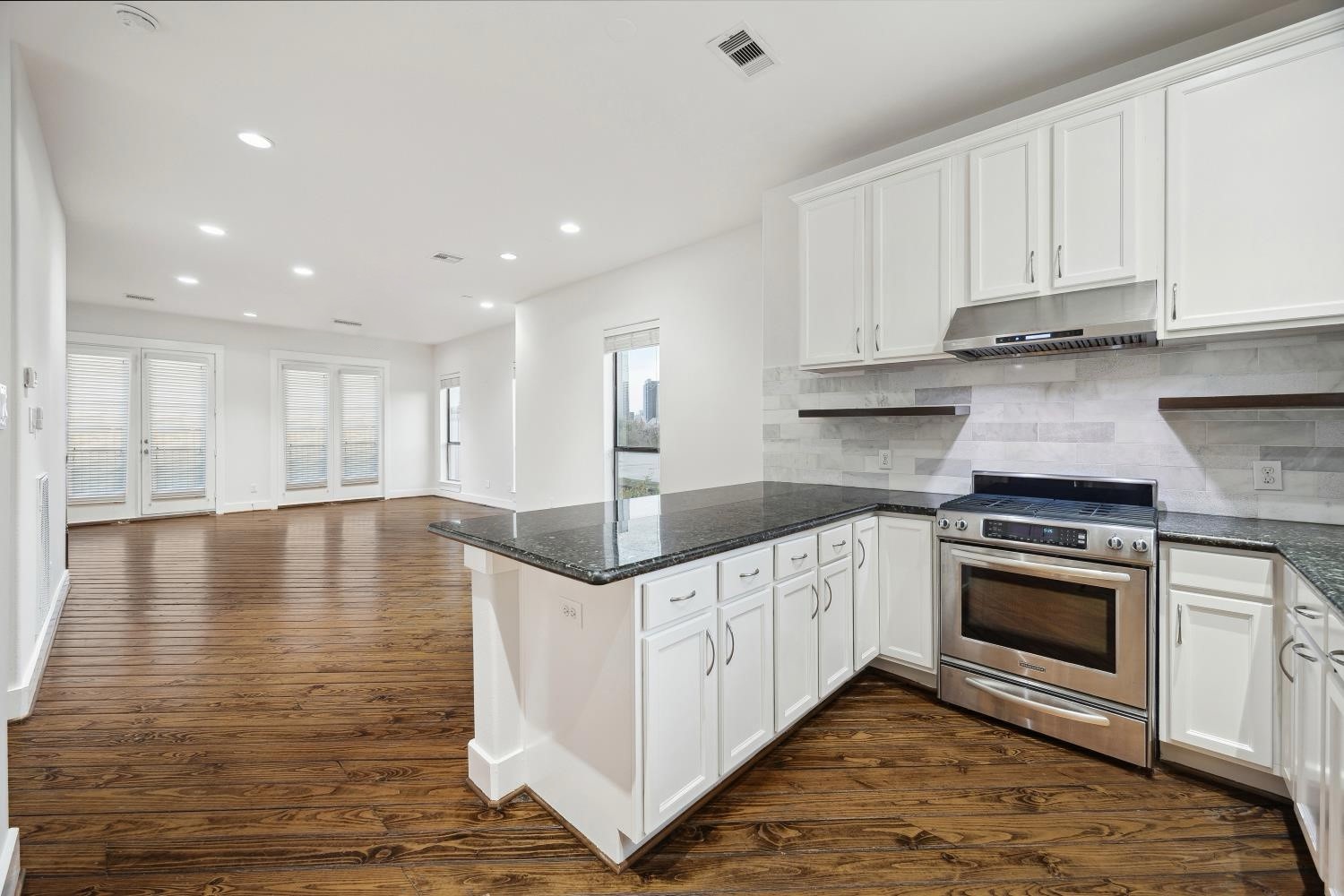 1819 Dart Street Houston, TX 77007 - Photo 18 of 30 Natural stone countertops with abundant cabinetry