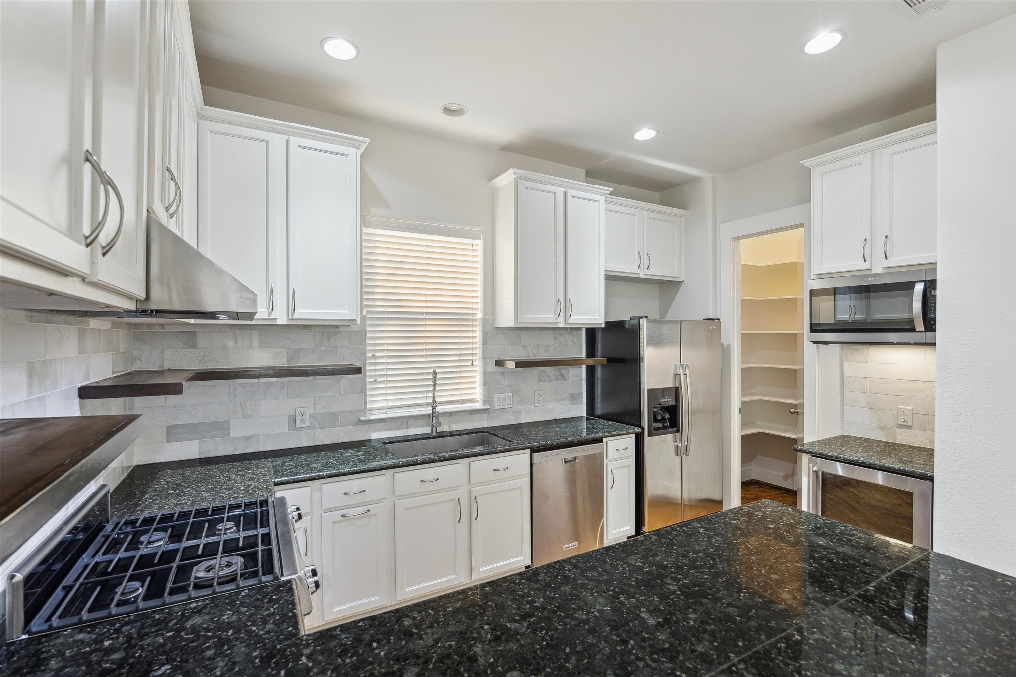 1819 Dart Street Houston, TX 77007 - Photo 19 of 30 Sneak a peek into the walk-in pantry on the right