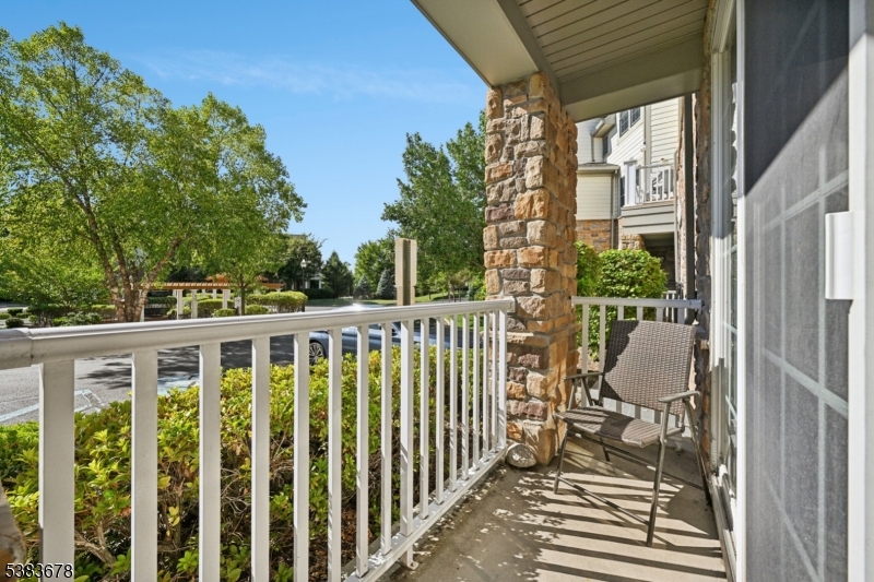 252 Victoria Drive, Unit 252 Bridgewater, NJ 08807 - Photo 19 of 26 a view of a balcony with chairs