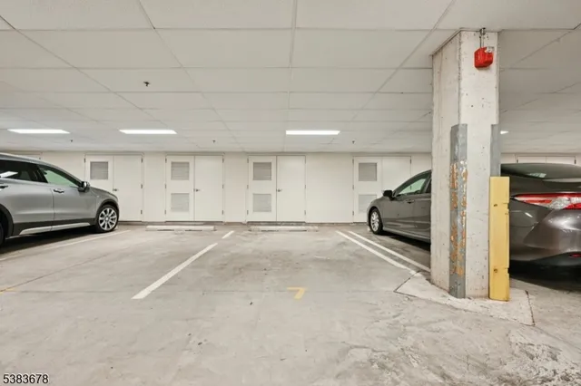 a view of parking area and car parked