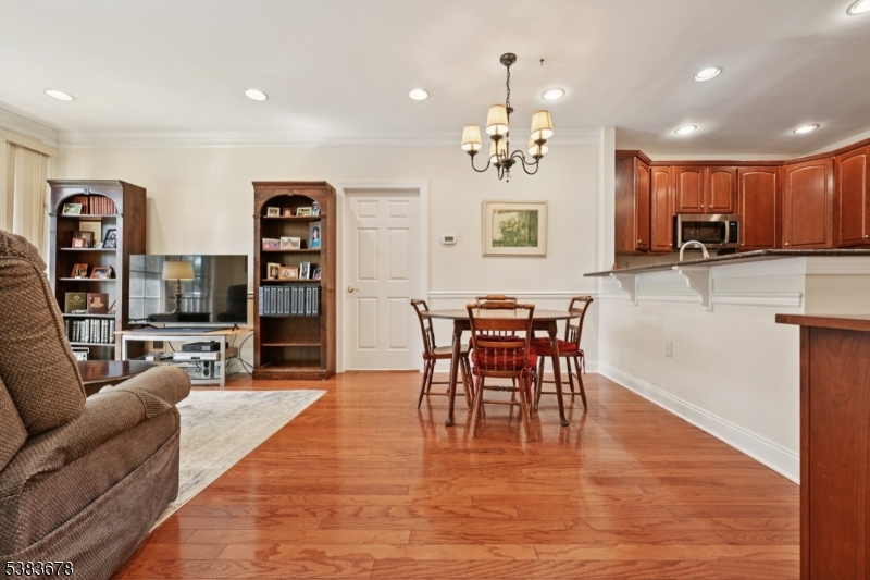252 Victoria Drive, Unit 252 Bridgewater, NJ 08807 - Photo 5 of 26 a view of a dining room with furniture