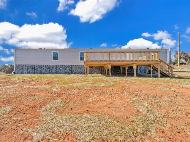 a view of a house with swimming pool