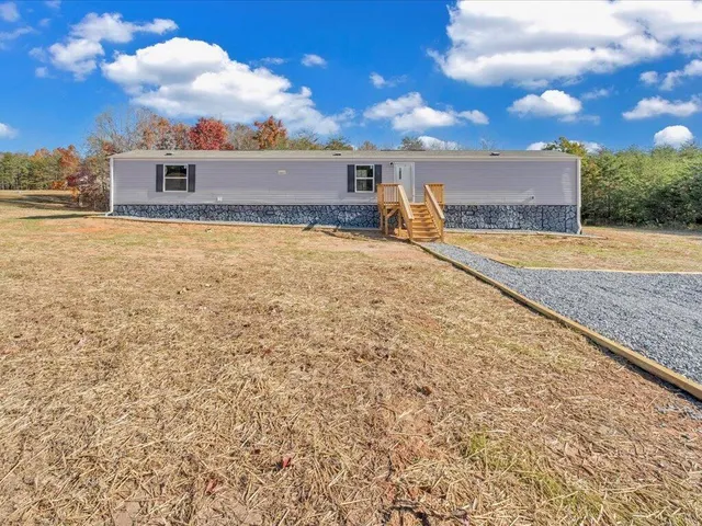 a view of a backyard of a house