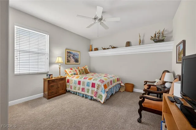 a kids room with a bed and a chair