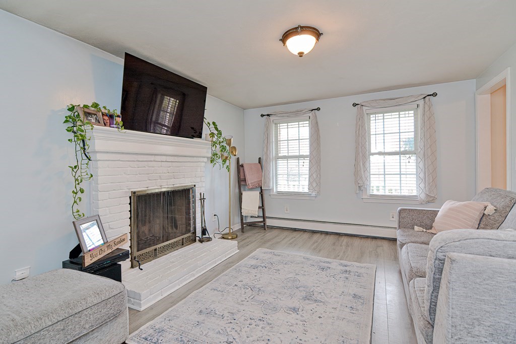 20 Prouty Lane Rutland, MA 01543 - Photo 12 of 40 a living room with furniture and a fireplace