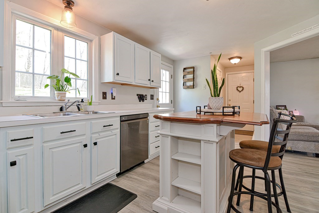 20 Prouty Lane Rutland, MA 01543 - Photo 16 of 40 a kitchen with a sink stove and cabinets