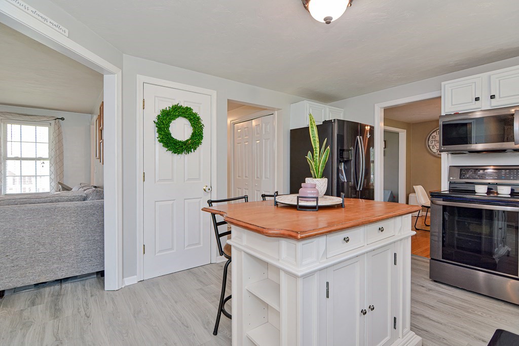 20 Prouty Lane Rutland, MA 01543 - Photo 17 of 40 a view of kitchen island with wooden floor