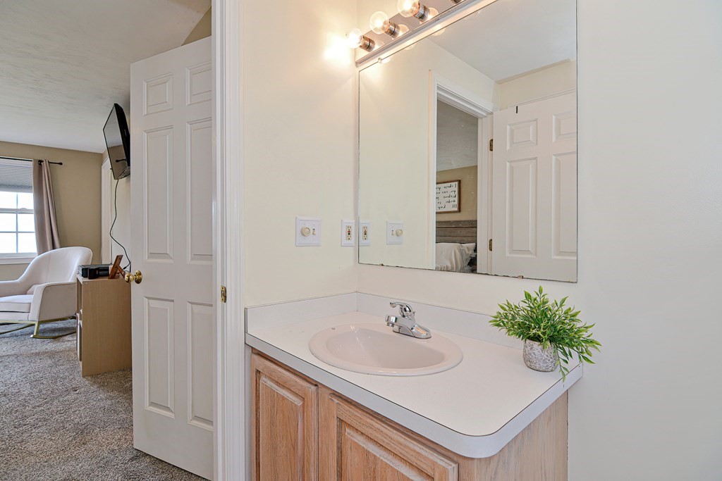 20 Prouty Lane Rutland, MA 01543 - Photo 22 of 40 a bathroom with a sink and a mirror