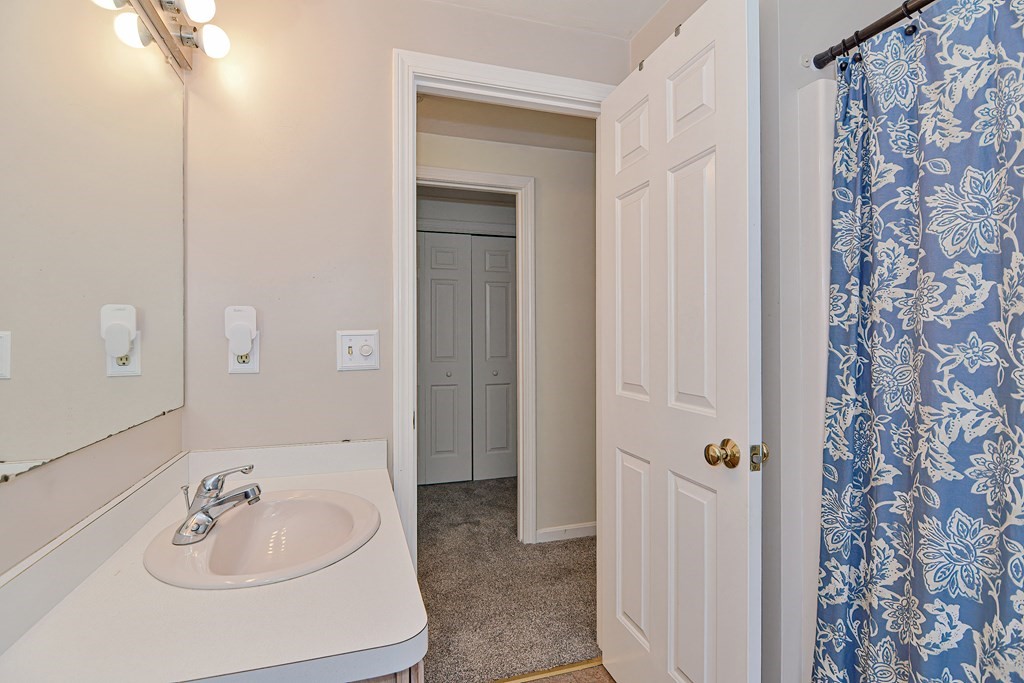 20 Prouty Lane Rutland, MA 01543 - Photo 24 of 40 a bathroom with a sink and a mirror