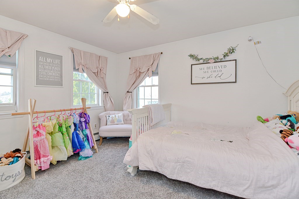 20 Prouty Lane Rutland, MA 01543 - Photo 25 of 40 a bedroom with a bed and a couch