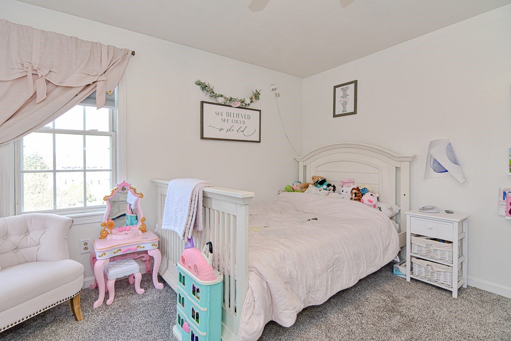 20 Prouty Lane Rutland, MA 01543 - Photo 26 of 40 a bedroom with a bed and a window