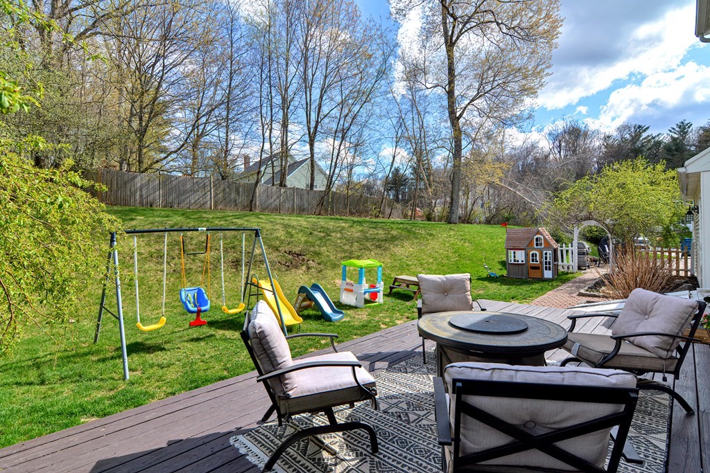 20 Prouty Lane Rutland, MA 01543 - Photo 32 of 40 a view of a chairs and table in patio with a yard
