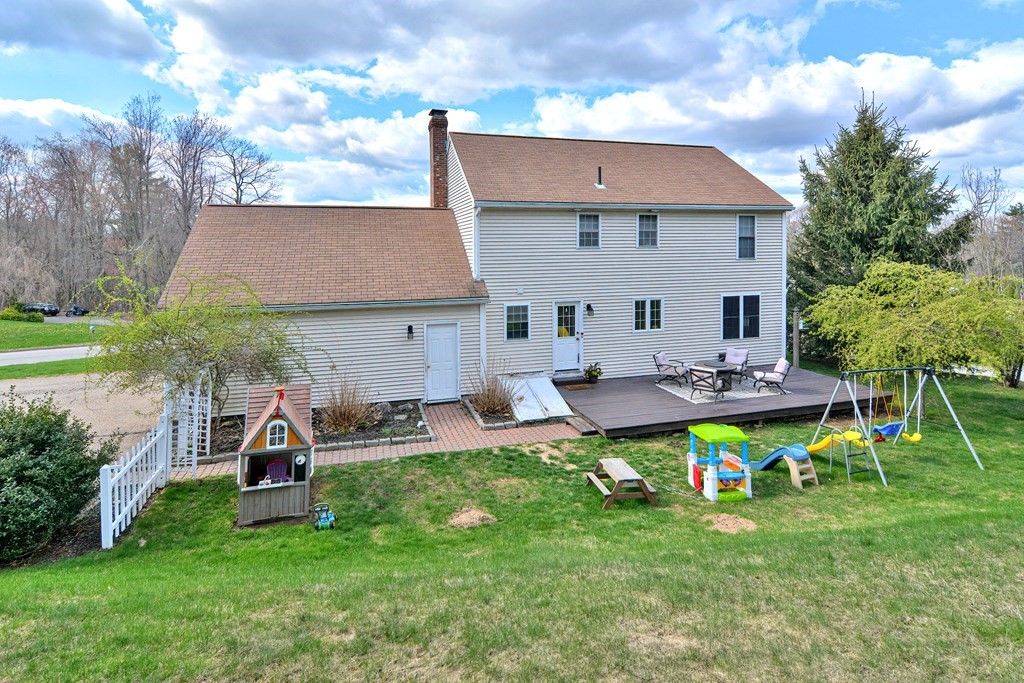 20 Prouty Lane Rutland, MA 01543 - Photo 34 of 40 a view of a patio with table and chairs and potted plants