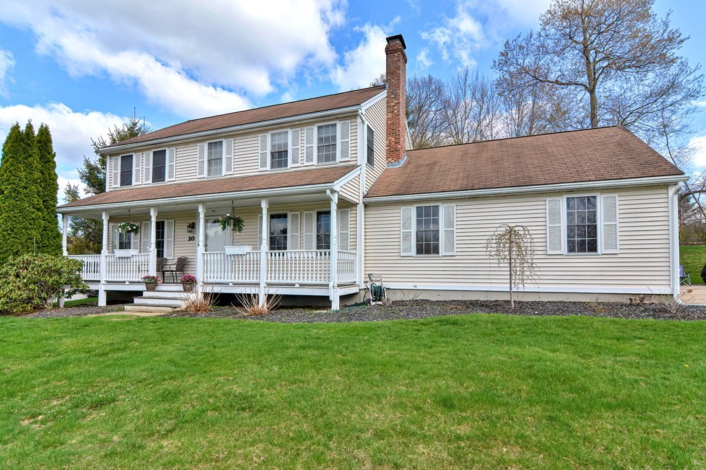 20 Prouty Lane Rutland, MA 01543 - Photo 35 of 40 a front view of a house with a yard and trees