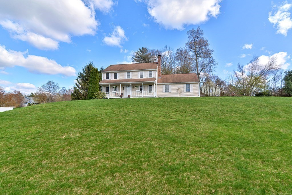 20 Prouty Lane Rutland, MA 01543 - Photo 36 of 40 a view of a house with a big yard and large trees