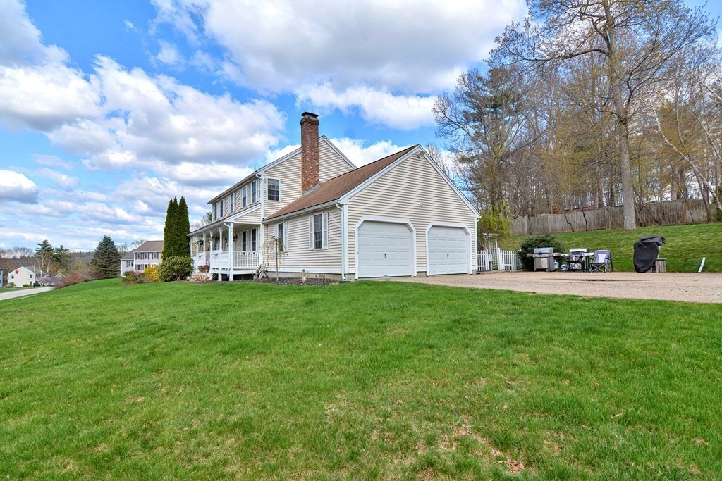 20 Prouty Lane Rutland, MA 01543 - Photo 38 of 40 a view of a house with a big yard plants and large trees