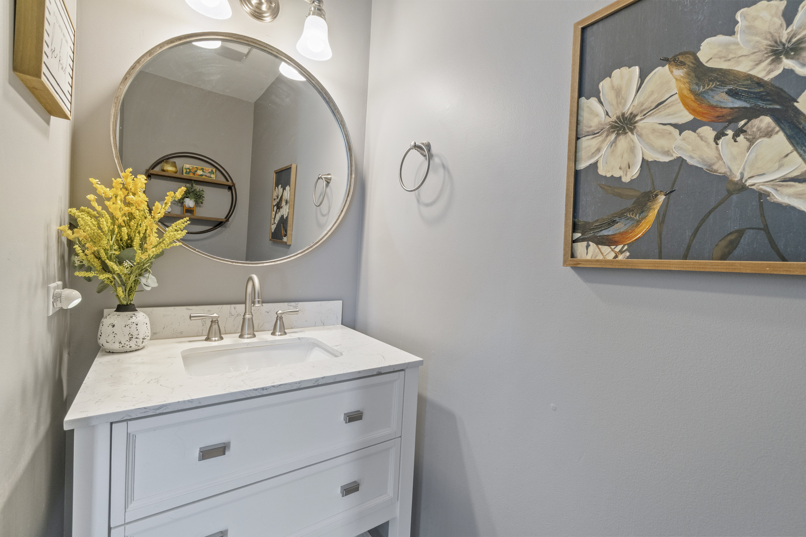 946 Pin Oak Circle Cary, IL 60013 - Photo 12 of 35 a bathroom with a sink and mirror