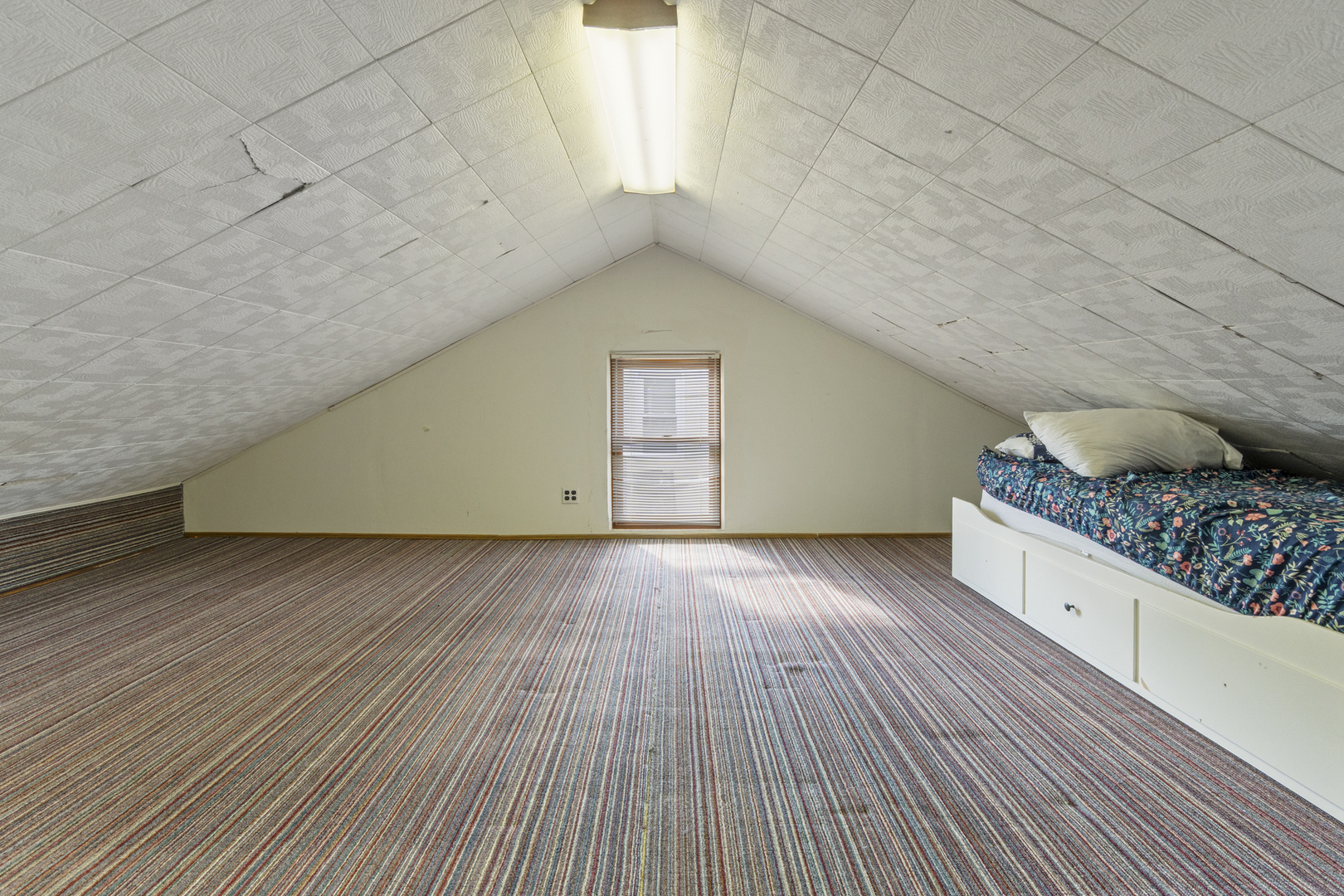 946 Pin Oak Circle Cary, IL 60013 - Photo 19 of 35 a view of an empty room with wooden floor and a window