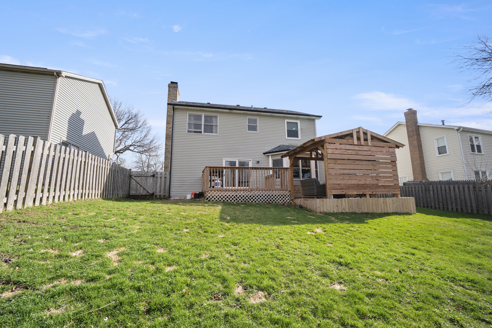 946 Pin Oak Circle Cary, IL 60013 - Photo 24 of 35 a view of a house with a yard