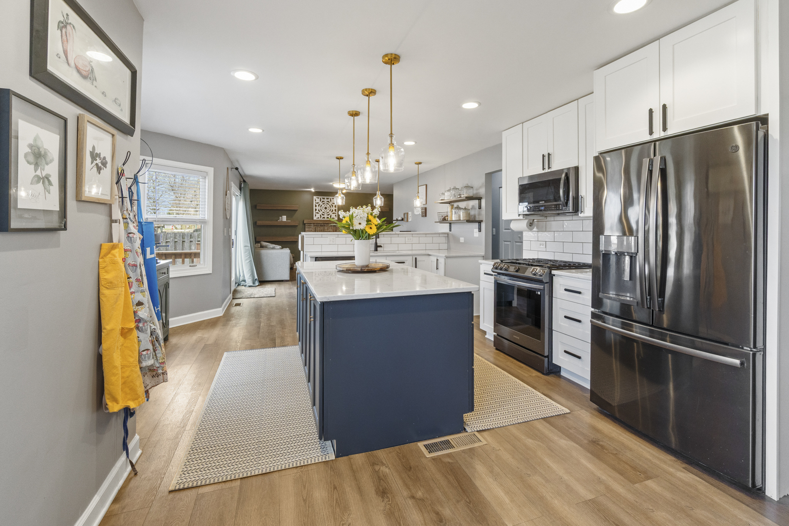 946 Pin Oak Circle Cary, IL 60013 - Photo 4 of 35 a kitchen with stainless steel appliances granite countertop a refrigerator a stove and a sink