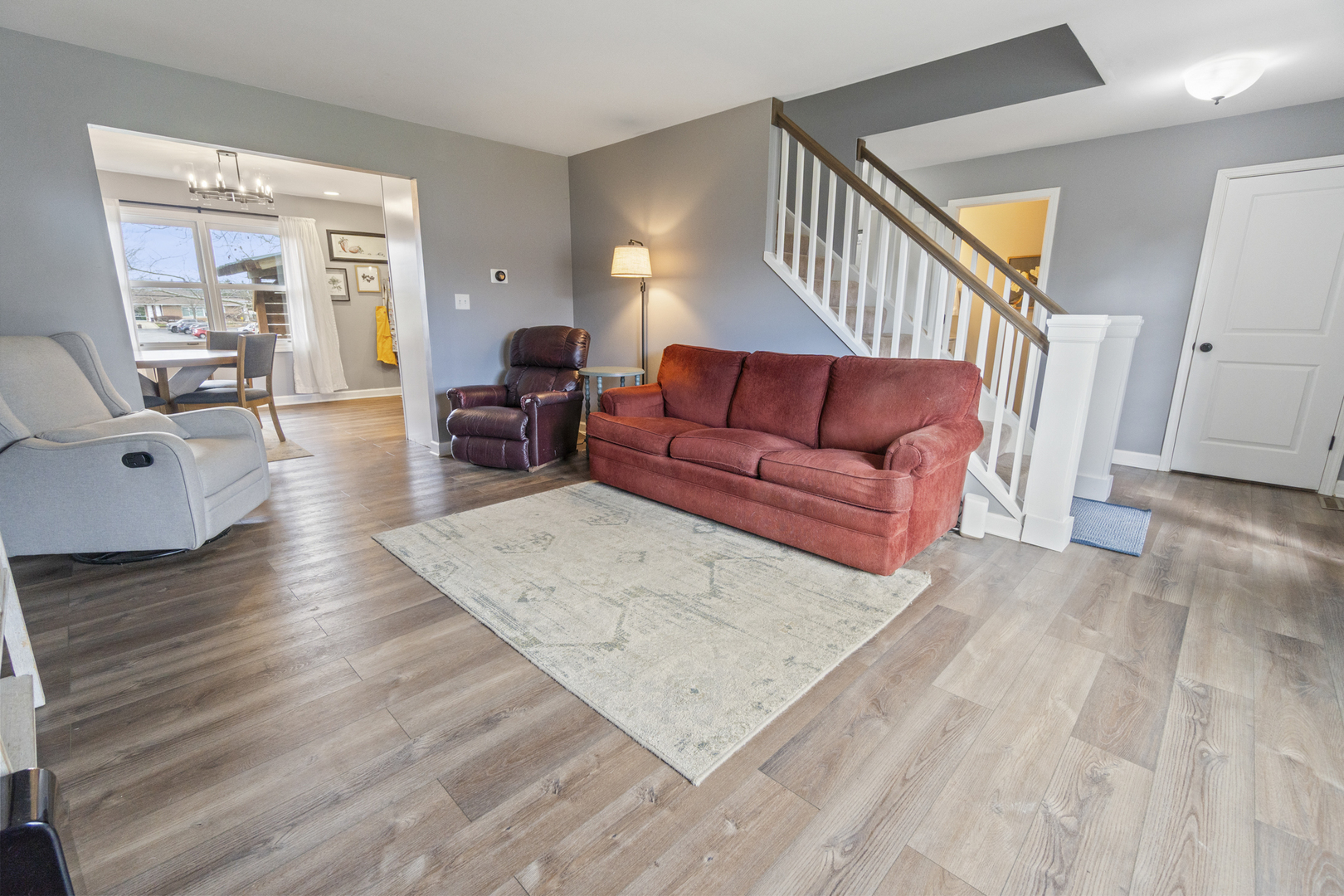 946 Pin Oak Circle Cary, IL 60013 - Photo 6 of 35 a living room with furniture and wooden floor
