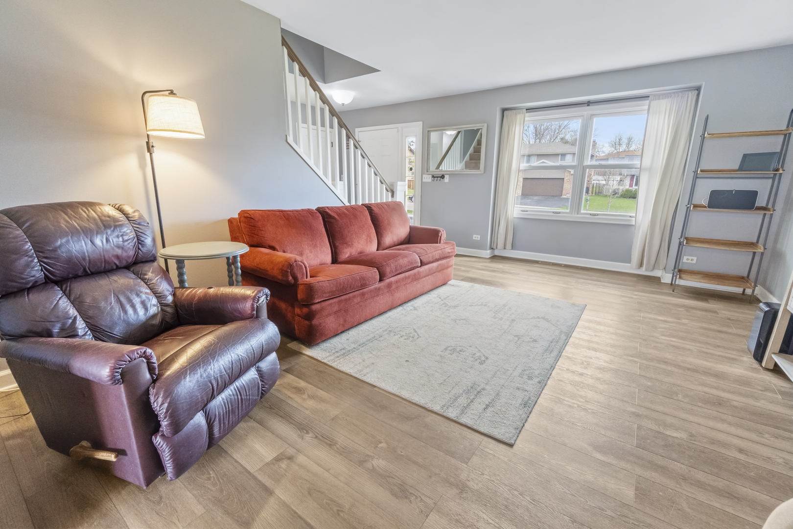 946 Pin Oak Circle Cary, IL 60013 - Photo 8 of 35 a living room with furniture and a window