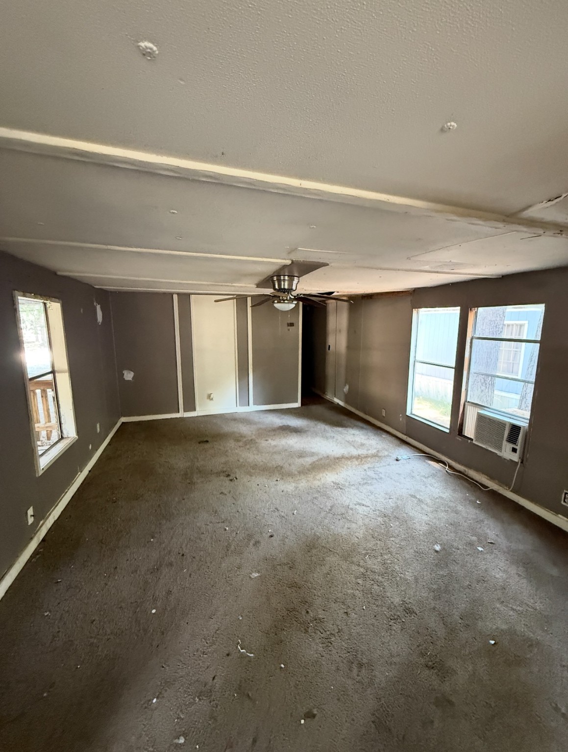 1059 Cardinal Lane Trinity, TX 75862 - Photo 5 of 7 a view of an empty room with a window
