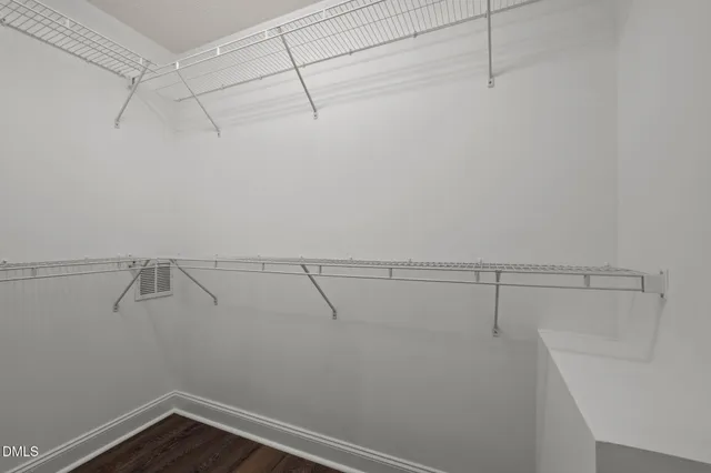 a view of a room with racks on the wall